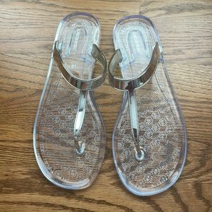 NIB London Rebel silver metallic clear thong